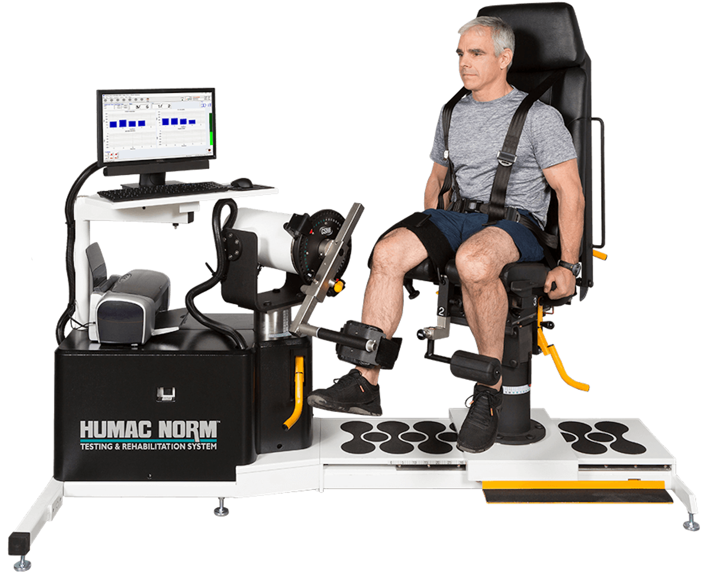 patient sitting on humac norm isokinetic extremity machine